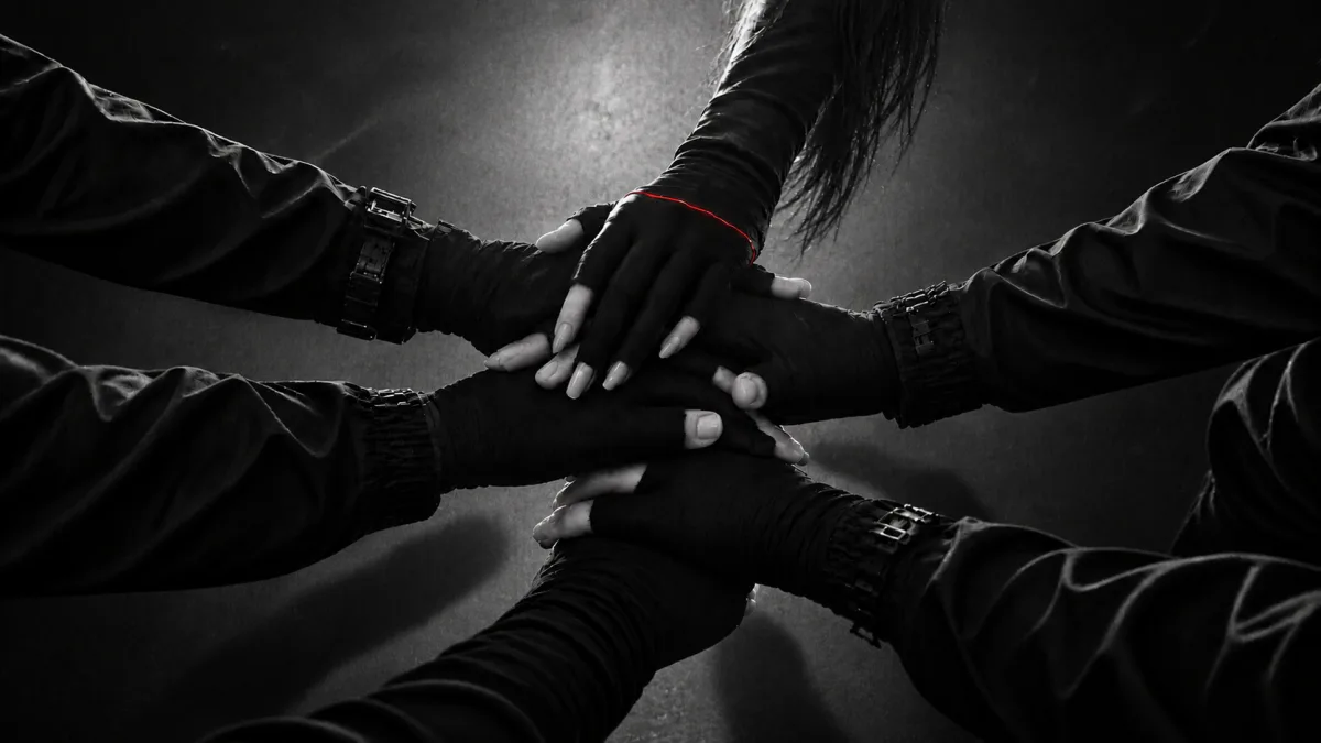 ④ Six hands just before the show — EVE's on top